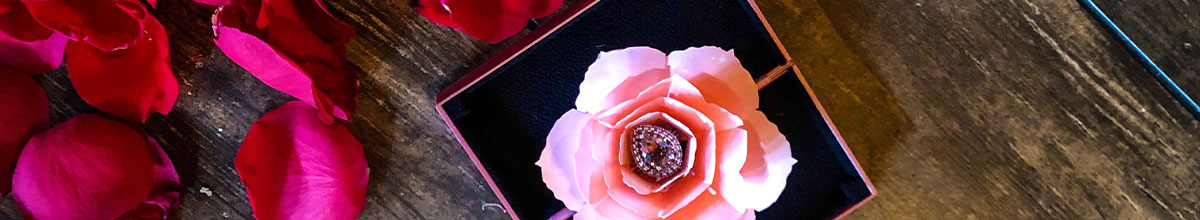 engagement ring with flower petals